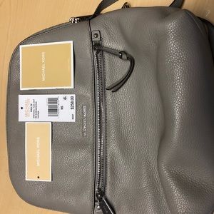 Michael Kors Rhea slim backpack used